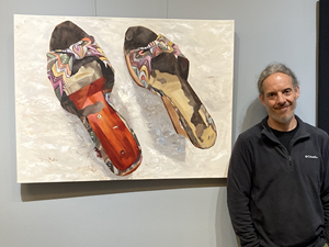 Artist with shoe painting